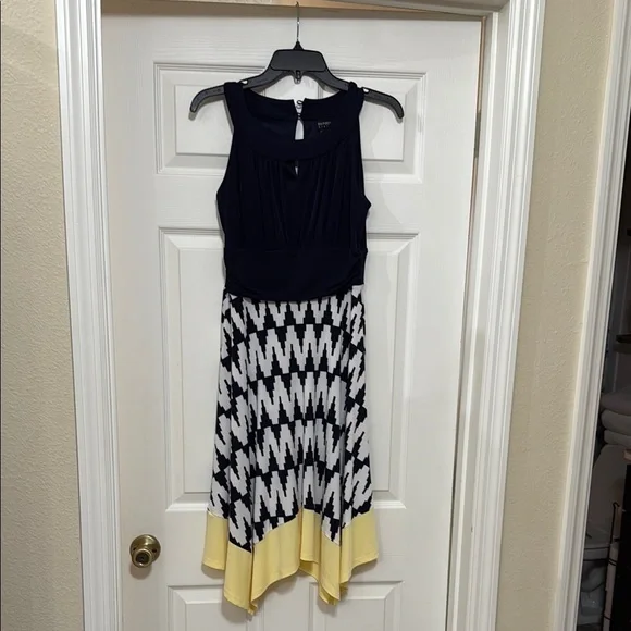 slim fit dress slacks MeetJen White Lace Sleeveless Asymmetrical Hem Fit Flare Dress NWT main image 1